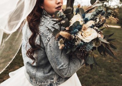 Wedding Bride holding flowers in hand